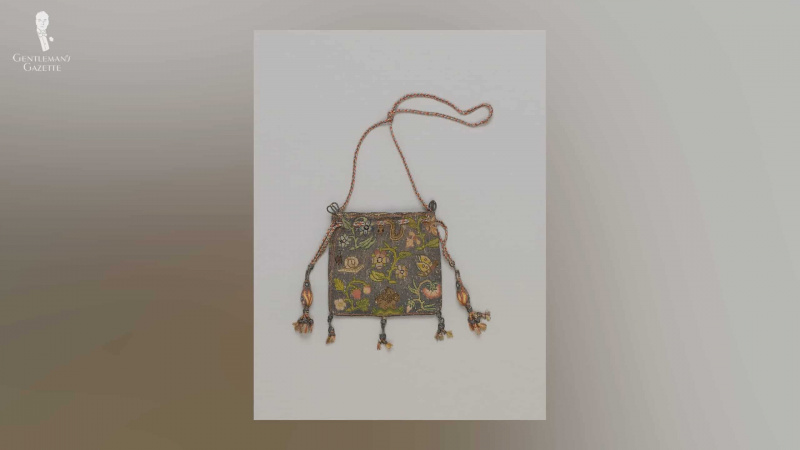 Een tas ontworpen met een ingewikkeld ontwerp en borduurwerk