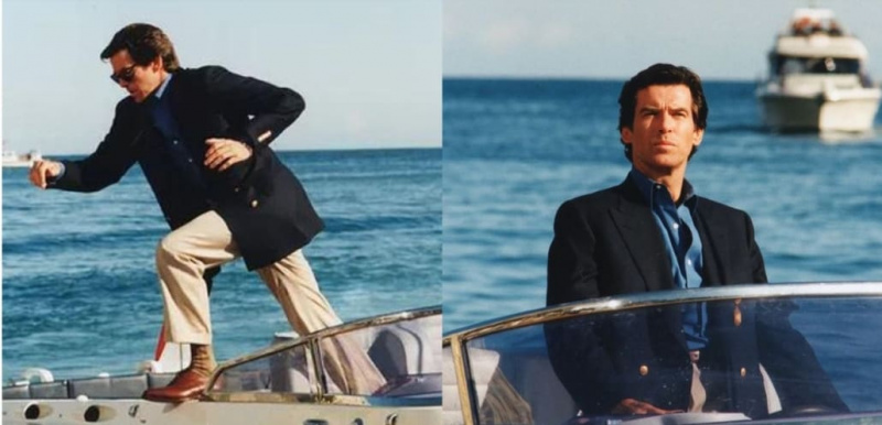 Pierce Brosnan como James Bond em GoldenEye, vestindo um blazer azul-marinho trespassado.