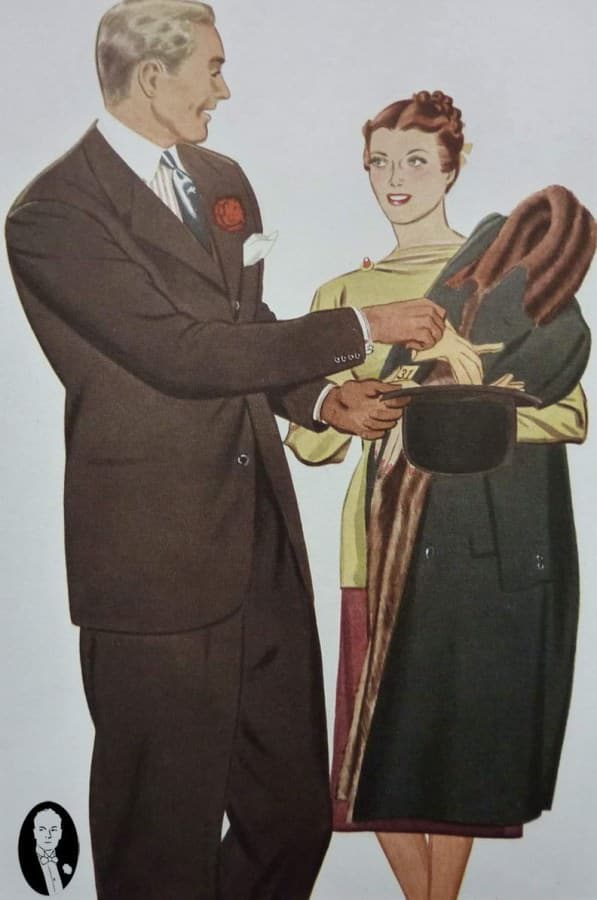 Costume marron anthracite de 1938 avec chemise Winchester, pochette en lin blanc et boutonnière œillet rouge foncé.