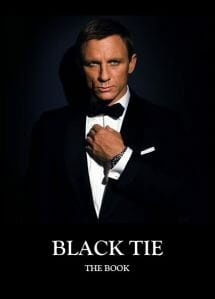 Daniel Craig v černé kravatě na obálce makety tištěného průvodce černými kravatami