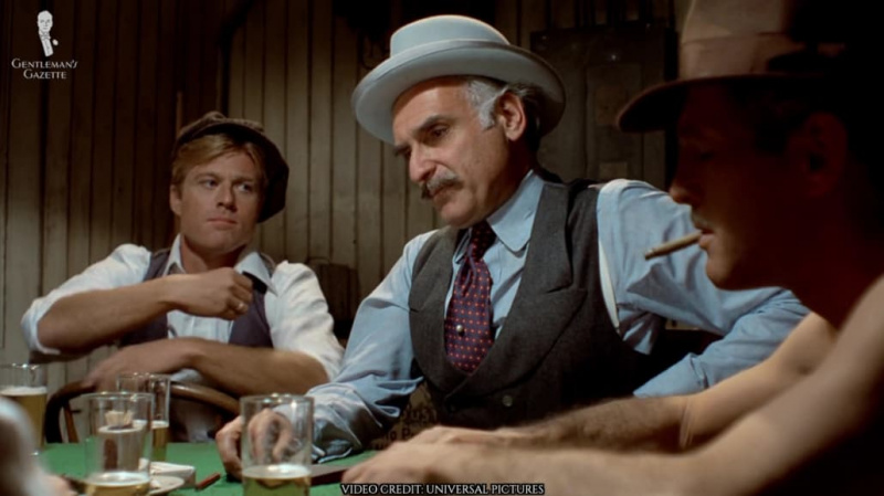 Robert Redford, Paul Newman e Robert Shaw jogando em The Stings