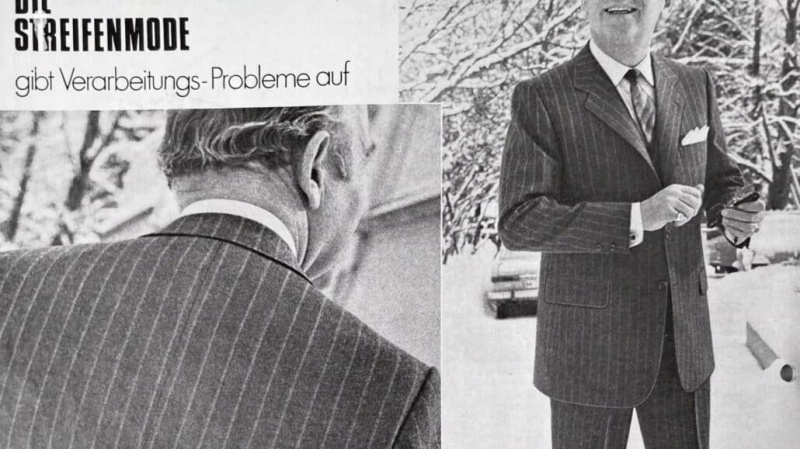 Um cavalheiro na década de 1960 vestindo um terno de negócios.
