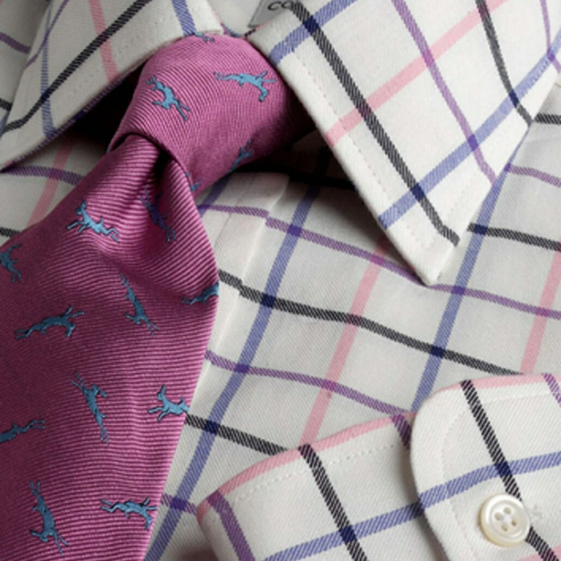 Таттерсалл кошуља из Цордингса укључује розе љубичасту, црну и плаву.