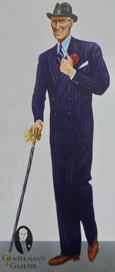 Costume 4x2 rayé marine boutonné sur le bouton du bas, chaussure en daim marron, chemise bleu clair, Lord noir