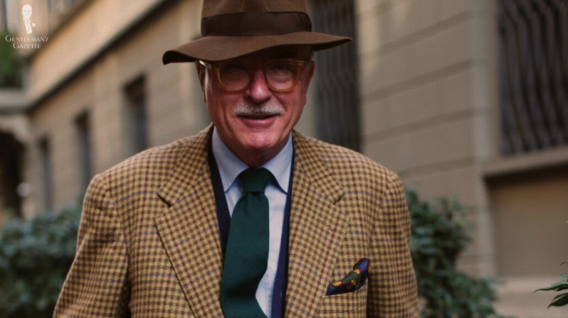Luciano Barbera je stylový komoda a to se odráží v jeho linii obleků.