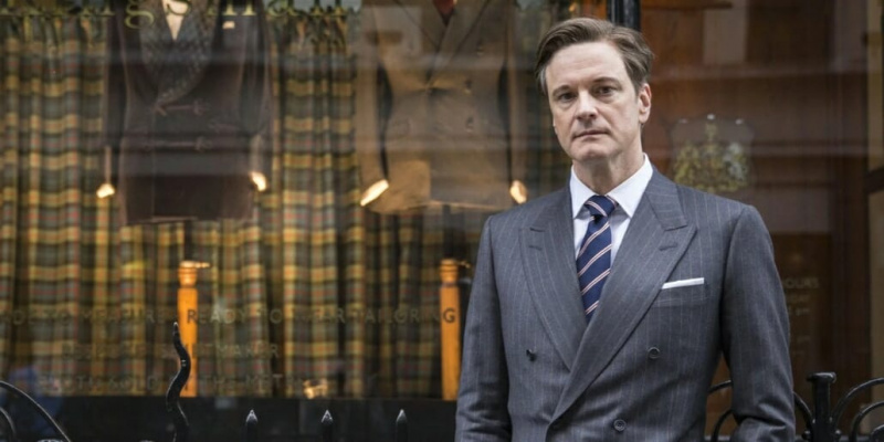 Colin Firth dans Kingsman portant un costume DB britannique classique avec des épaules rembourrées