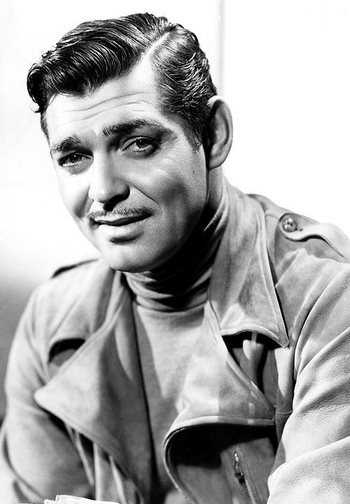 Clark Gable na sobě kabát s rolákovým svetrem