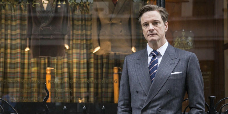 Colin Firth em Kingsman vestindo um terno britânico clássico com ombros acolchoados