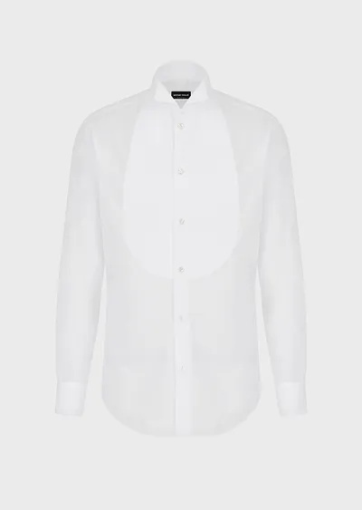 Chemise de smoking blanche en voile de coton transparent avec plastron, col et poignets en coton marcella.