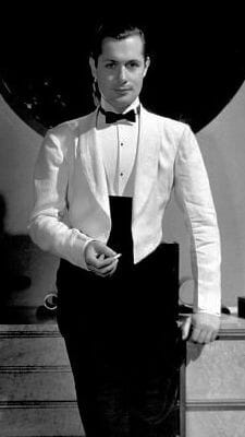O ator americano Robert Montgomery vestindo a nova interpretação informal da jaqueta de refeitório em 1932.