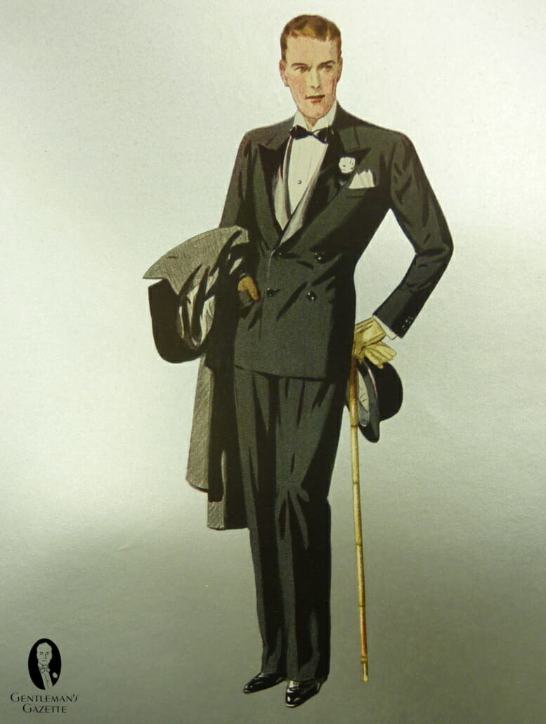 DB smoking iz 1930. sa satenskim laeplima, večernjim kaputom, štapom, boutonniereom, Homburg šeširom i rukavicama